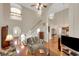 Spacious living room with hardwood floors, high ceilings, and a staircase at 3522 Estates Landing Nw Dr, Kennesaw, GA 30144