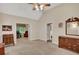 Spacious main bedroom with a view to an office space and ample closet storage at 3522 Estates Landing Nw Dr, Kennesaw, GA 30144