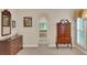 Lovely main bedroom with antique furnishings and a view into the ensuite at 3522 Estates Landing Nw Dr, Kennesaw, GA 30144