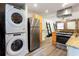 Modern kitchen equipped with stainless steel appliances, granite countertops, and exposed brick accent wall at 40 Daniel Se St # 1, Atlanta, GA 30312