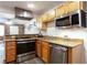 Well-equipped kitchen showcasing stainless steel appliances, modern cabinetry, and attractive granite countertops at 40 Daniel Se St # 1, Atlanta, GA 30312