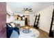 Comfortable living space with exposed brick, open to the kitchen, and modern decor touches at 40 Daniel Se St # 1, Atlanta, GA 30312