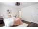 Bright bedroom featuring exposed brick accents, soft lighting, and ample closet space at 40 Daniel Se St # 1, Atlanta, GA 30312