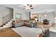 Spacious living room with hardwood floors, open layout, and staircase, great for modern living at 209 Breckenridge Ct, Canton, GA 30115