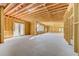 Spacious unfinished basement with exposed ceiling and concrete floors at 2551 Kilgore Rd, Buford, GA 30519
