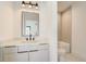 Bathroom with a single sink vanity and modern fixtures at 2551 Kilgore Rd, Buford, GA 30519
