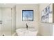 Spa-like bathroom featuring a freestanding tub, glass shower, and serene natural light at 2551 Kilgore Rd, Buford, GA 30519