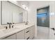 Bright bathroom with double sink vanity and modern fixtures at 2551 Kilgore Rd, Buford, GA 30519