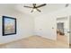 Bright bedroom with hardwood floors, ceiling fan, window and closet at 2551 Kilgore Rd, Buford, GA 30519