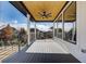 Spacious outdoor deck with ceiling fan and neighborhood views at 2551 Kilgore Rd, Buford, GA 30519