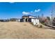 Modern two-story home featuring a flat roof, mixed siding materials, and well-maintained landscaping on a spacious lot at 2551 Kilgore Rd, Buford, GA 30519
