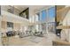 Spacious living room with soaring ceilings, large windows, and open floor plan at 2551 Kilgore Rd, Buford, GA 30519