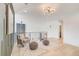 Bright and airy loft with comfortable seating, stylish lighting, and a modern aesthetic at 2551 Kilgore Rd, Buford, GA 30519