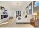 Comfortable main bedroom featuring elegant decor, a modern fireplace, and cozy furnishings at 2551 Kilgore Rd, Buford, GA 30519