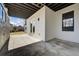 Covered patio featuring a concrete floor and painted brick at 2551 Kilgore Rd, Buford, GA 30519