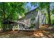 Contemporary home with multiple decks and levels with wooded surroundings at 3430 Rocky Springs Ct, Marietta, GA 30062