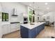 Open kitchen with stainless steel appliances, ample counter space, and a breakfast area for easy meals at 3430 Rocky Springs Ct, Marietta, GA 30062