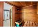 Interior view of a wood sauna featuring wood benches and a heater at 3430 Rocky Springs Ct, Marietta, GA 30062