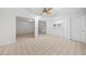 Finished basement featuring neutral carpet, white trim, and multiple spaces at 5190 Beech Forest Sw Dr, Lilburn, GA 30047