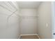 Walk-in closet with wire shelving and carpet flooring at 2317 Church Street, Hampton, GA 30228