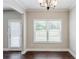 Bright dining room with natural light and a door to the outdoor patio at 2317 Church Street, Hampton, GA 30228