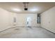 Large garage featuring an open door and a water heater at 2317 Church Street, Hampton, GA 30228