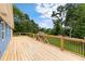 The back deck is newly renovated and boasts a beautiful backyard view at 319 Hill Crest Cir, Woodstock, GA 30188