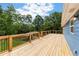 Enjoy beautiful tree views from this newly renovated back deck at 319 Hill Crest Cir, Woodstock, GA 30188