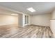 A finished basement featuring durable flooring and a neutral color palette at 319 Hill Crest Cir, Woodstock, GA 30188
