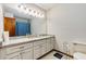 Bathroom featuring a large vanity, ample storage, and a well-lit mirror at 319 Hill Crest Cir, Woodstock, GA 30188