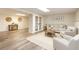 A staged living room showcases modern decor and durable flooring at 319 Hill Crest Cir, Woodstock, GA 30188