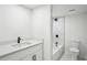 Modern bathroom featuring a vanity with a vessel sink, a sleek mirror, and a tub/shower combo at 3455 Broxton Mill Way, Snellville, GA 30039