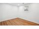Bedroom featuring hard wood floors, and a large window letting in lots of light at 3455 Broxton Mill Way, Snellville, GA 30039