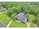 An expansive property with a sparkling pool, and lush greenery, creating a serene retreat at 704 Branchview Ct, Mcdonough, GA 30252