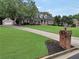 Charming two-story home with manicured lawn and patriotic decorations at 704 Branchview Ct, Mcdonough, GA 30252