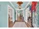 Charming foyer with view of the kitchen, living room, and playroom at 704 Branchview Ct, Mcdonough, GA 30252
