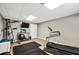 A home gym equipped with fitness machines, perfect for working out in the comfort of your own home at 704 Branchview Ct, Mcdonough, GA 30252