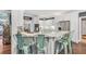This bright eat-in kitchen has seating and stainless steel appliances at 704 Branchview Ct, Mcdonough, GA 30252