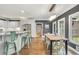 This eat-in kitchen features a bar and stainless steel appliances at 704 Branchview Ct, Mcdonough, GA 30252