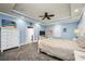 Spacious main bedroom with recessed lighting, coastal decor, and a ceiling fan at 704 Branchview Ct, Mcdonough, GA 30252