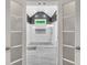 Beautiful walk-in shower with decorative stone flooring and wall niche at 704 Branchview Ct, Mcdonough, GA 30252