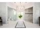 Lavish bathroom with dual glass showers, freestanding tub, and elegant chandelier, offering a spa-like experience at 1822 Chartwell Trce, Stone Mountain, GA 30087
