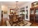 Cozy dining room with chandelier and French doors at 1822 Chartwell Trce, Stone Mountain, GA 30087