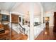 Grand foyer with hardwood floors, a stunning chandelier, and elegant staircase, creating a luxurious entrance to the home at 1822 Chartwell Trce, Stone Mountain, GA 30087