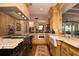 Gourmet kitchen with granite countertops, stainless steel appliances, and custom cabinetry at 1822 Chartwell Trce, Stone Mountain, GA 30087