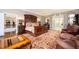 Luxurious main bedroom with a large bed, decorative rug, and ample natural light, creating a relaxing and inviting space at 1822 Chartwell Trce, Stone Mountain, GA 30087