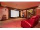 Home theater with projector screen, comfortable seating, and decorative accents at 1822 Chartwell Trce, Stone Mountain, GA 30087