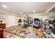 Home gym featuring a treadmill, weight machines, and mirrored wall for fitness enthusiasts at 1822 Chartwell Trce, Stone Mountain, GA 30087