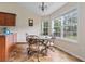 Charming kitchen nook with tiled floors, a breakfast table, and large windows offering natural light and views at 3834 Hawk Tail Dr, Loganville, GA 30052
