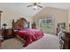 Spacious main bedroom featuring vaulted ceiling, natural light, and neutral carpet at 3834 Hawk Tail Dr, Loganville, GA 30052